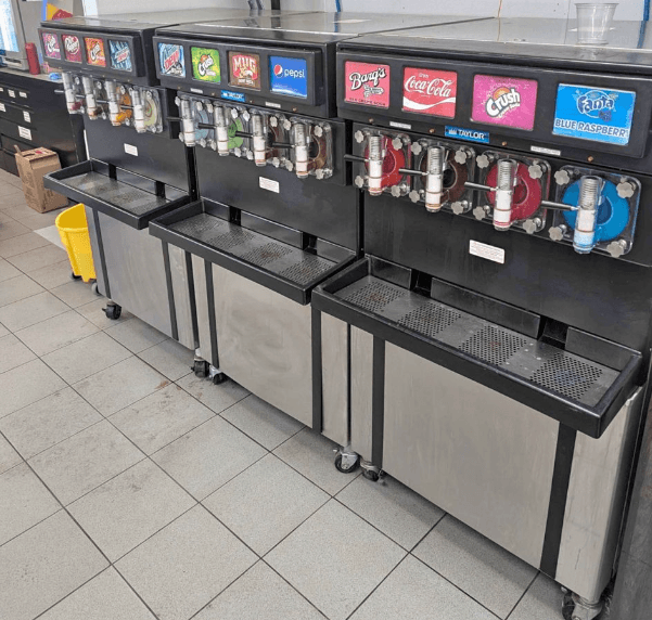 Row of Taylor frozen beverage dispensers maintained by Aaron Cold Tech